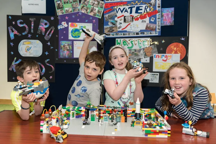 Astro Kids displaying their LEGO creations